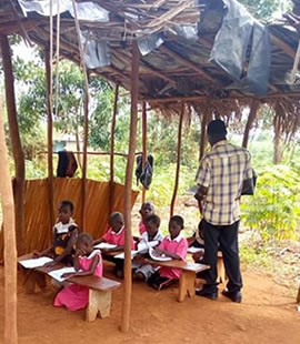 Pupils attending to lessons in a poor class room